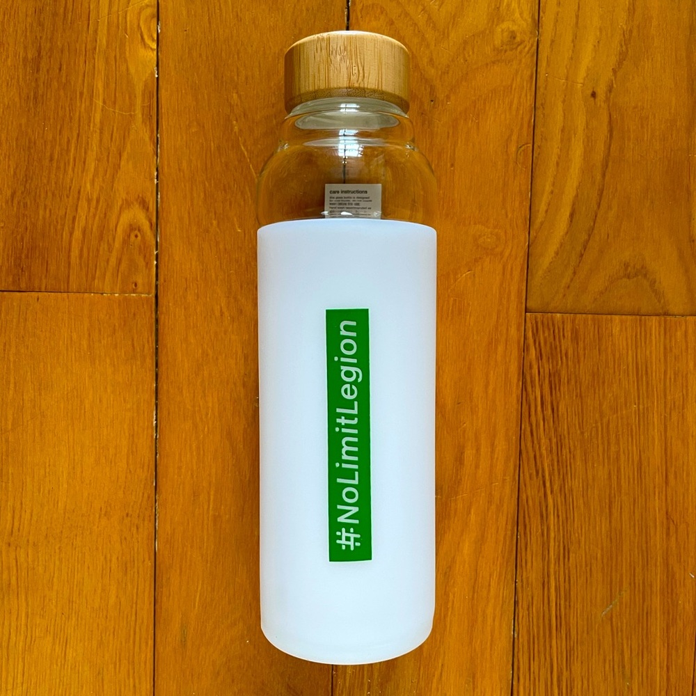PELOTON Exclusive #NoLimitLegion Brand New Glass Water Bottle from Pelothon.